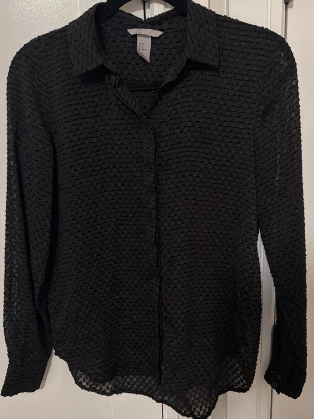 Black textured velvet mesh blouse with button-up front and long sleeves